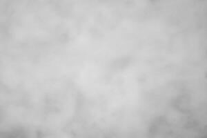 Blured gray decorative plaster or concrete. Abstract grunge background for design. photo