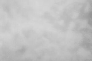 Blured gray decorative plaster or concrete. Abstract grunge background for design. photo