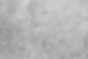 Blured gray decorative plaster or concrete. Abstract grunge background for design. photo