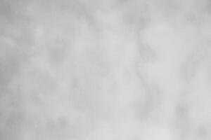 Blured gray decorative plaster or concrete. Abstract grunge background for design. photo
