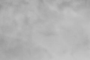 Blured gray decorative plaster or concrete. Abstract grunge background for design. photo