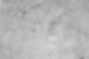 Blured gray decorative plaster or concrete. Abstract grunge background for design. photo