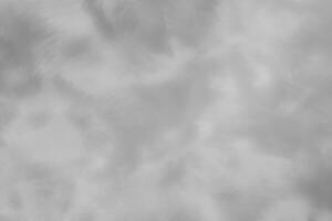 Blured gray decorative plaster or concrete. Abstract grunge background for design. photo