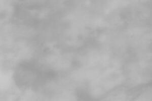 Blured gray decorative plaster or concrete. Abstract grunge background for design. photo