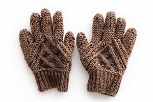 Cozy brown knit gloves showcasing intricate patterns on white background. Winter warmth and style photo