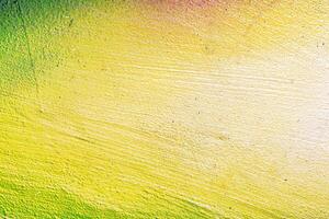 A fragment of colorful graffiti painted on a wall. Abstract urban background. photo