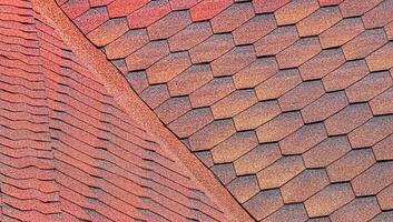 The texture of red tile roof covering. photo