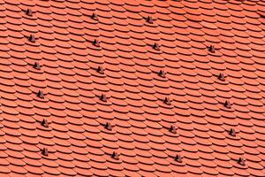 el textura de rojo loseta techo cubierta. foto