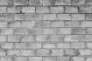 Wall texture from gray concrete old bricks. Abstract background. photo