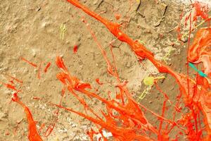 A fragment of colorful graffiti painted on a wall. Abstract urban background. photo