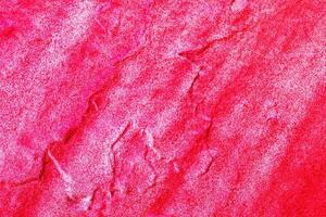 A fragment of colorful graffiti painted on a wall. Abstract urban background. photo