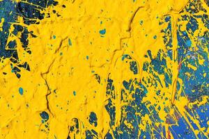 A fragment of colorful graffiti painted on a wall. Abstract urban background. photo