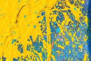 A fragment of colorful graffiti painted on a wall. Abstract urban background. photo