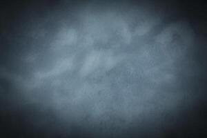 Blured pastel color decorative plaster or concrete background with vignette. photo