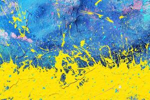 A fragment of colorful graffiti painted on a wall. Abstract urban background. photo