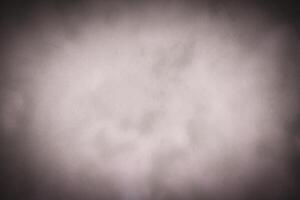 Blured pastel color decorative plaster or concrete background with vignette. photo