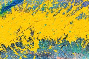 A fragment of colorful graffiti painted on a wall. Abstract urban background. photo