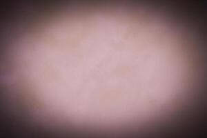Blured pastel color decorative plaster or concrete background with vignette. photo