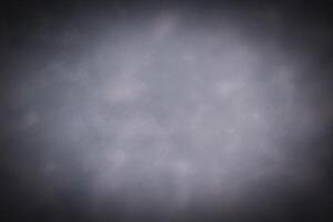 Blured pastel color decorative plaster or concrete background with vignette. photo