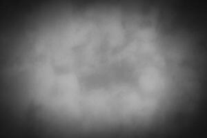 Blured gray decorative plaster or concrete background with vignette. photo