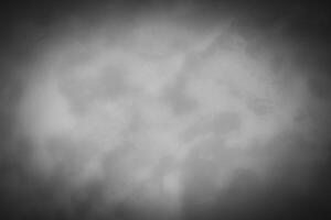 Blured gray decorative plaster or concrete background with vignette. photo