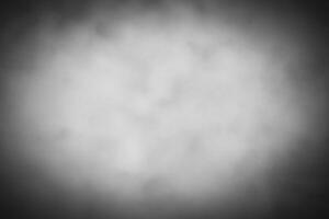 Blured gray decorative plaster or concrete background with vignette. photo