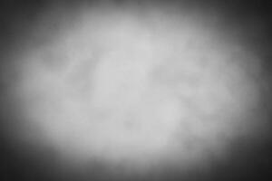 Blured gray decorative plaster or concrete background with vignette. photo