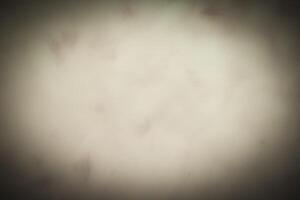 Blured pastel color decorative plaster or concrete background with vignette. photo