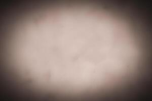 Blured pastel color decorative plaster or concrete background with vignette. photo