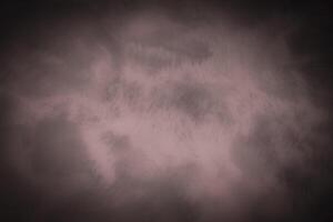 Blured monochrome decorative plaster or concrete background with vignette. photo