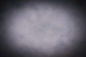 Blured pastel color decorative plaster or concrete background with vignette. photo