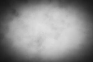 Blured gray decorative plaster or concrete background with vignette. photo