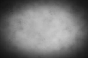 Blured gray decorative plaster or concrete background with vignette. photo