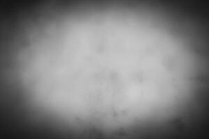 Blured gray decorative plaster or concrete background with vignette. photo
