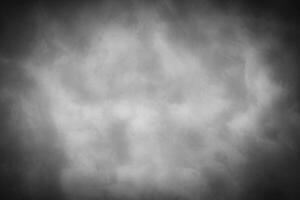Gray decorative plaster or concrete background with vignette. photo