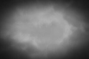 Blured gray decorative plaster or concrete background with vignette. photo