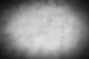 Gray decorative plaster or concrete background with vignette. photo