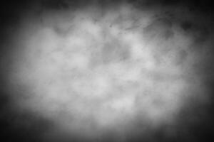 Gray decorative plaster or concrete background with vignette. photo