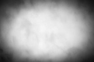 Gray decorative plaster or concrete background with vignette. photo