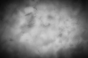 Gray decorative plaster or concrete background with vignette. photo