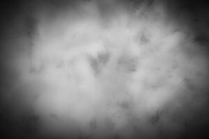 Gray decorative plaster or concrete background with vignette. photo
