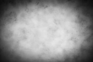 Gray decorative plaster or concrete background with vignette. photo