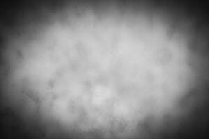 Gray decorative plaster or concrete background with vignette. photo