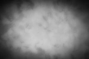 Gray decorative plaster or concrete background with vignette. photo