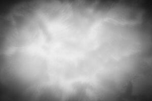 Gray decorative plaster or concrete background with vignette. photo