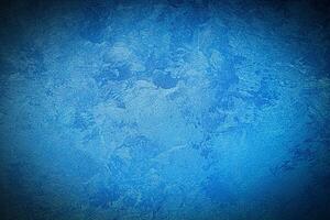 Texture of blue decorative plaster or concrete with vignette. photo