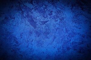 Texture of blue decorative plaster or concrete with vignette. photo