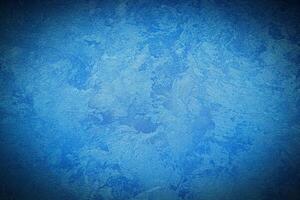 Texture of blue decorative plaster or concrete with vignette. photo