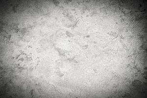 Texture of gray decorative plaster or concrete with vignette. photo