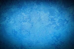 Texture of blue decorative plaster or concrete with vignette. photo